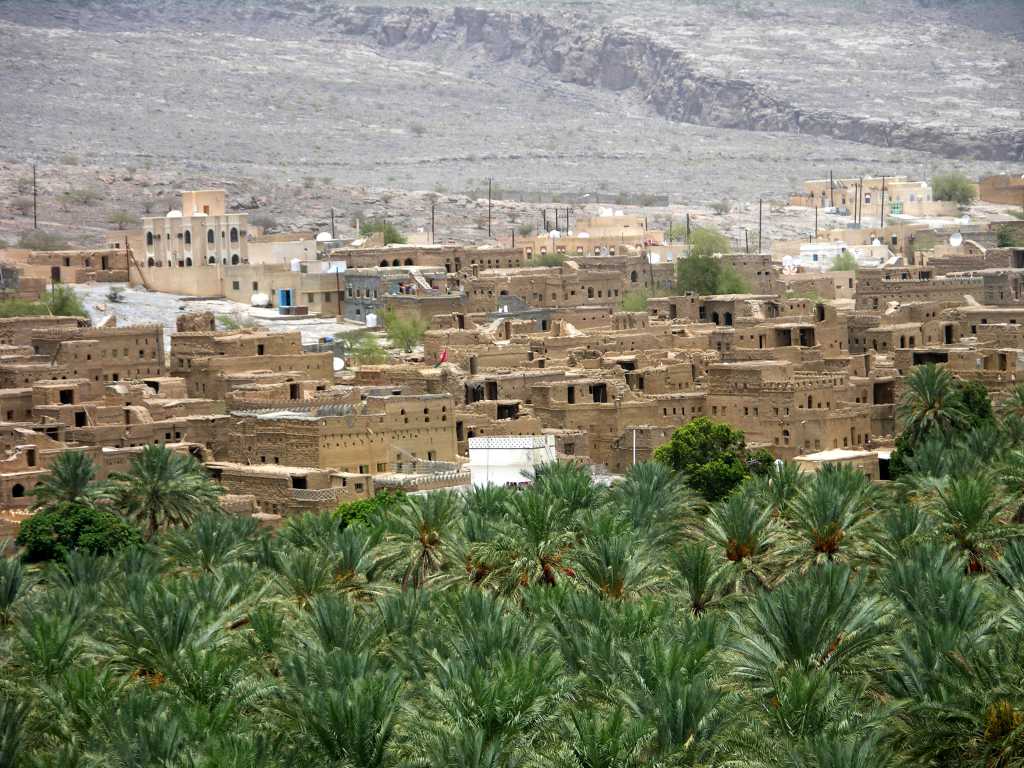 Muscat 07 06 Al Hamra With Palm Trees Al-Hamra is one of the oldest Oman villages, sitting at the foot of the Hajar Mountains. There are several 400 year-old two- and three-story mud brick houses still standing and occupied to this day.